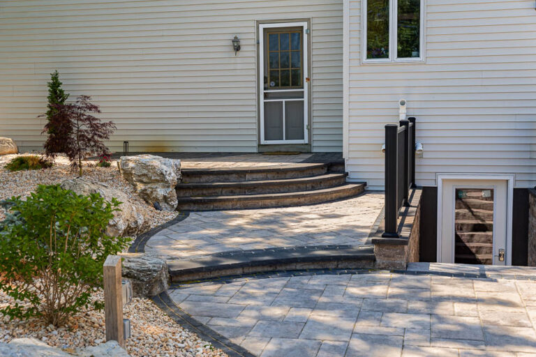 Beautiful hardscape design by Authentic Homescapes, showcasing elegant outdoor living areas and calming water features.