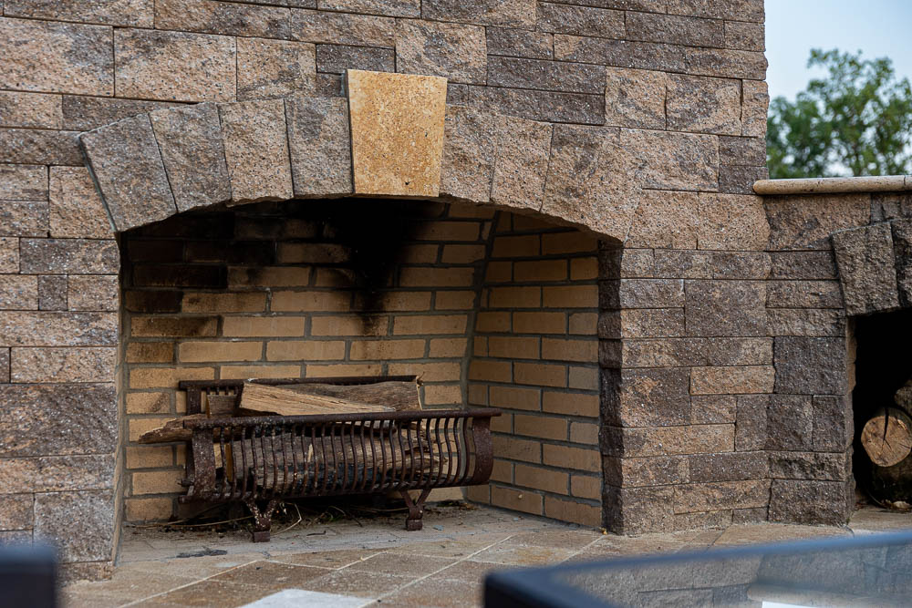 outdoor fireplace with logs
