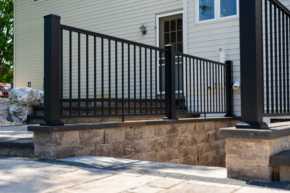Raised patio terrace bordered by retaining walls